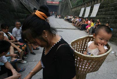 Мати і дитина. Фото: China Photos/getty Images 